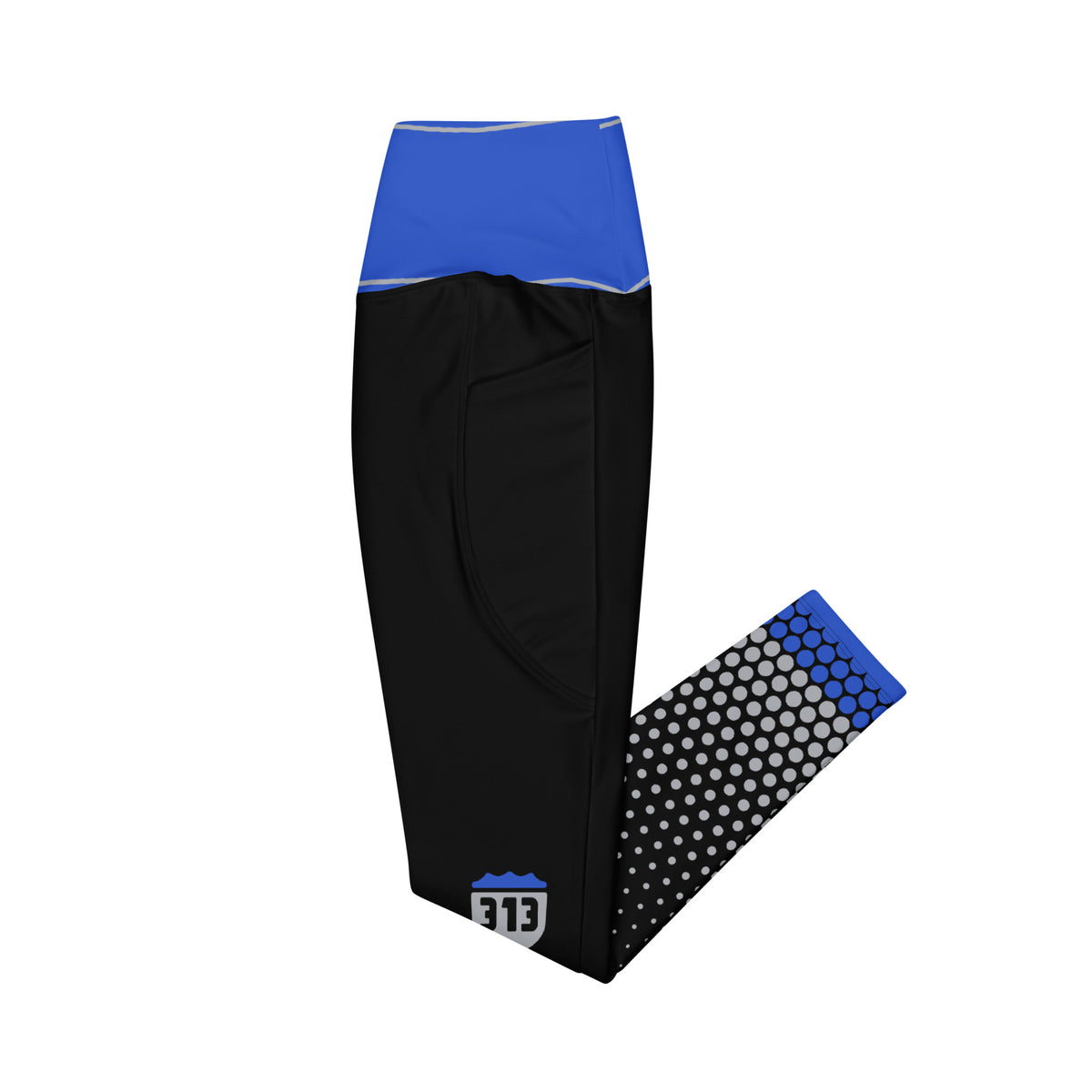 Left side view of Concrete Fairways leggings showing the black side pocket, royal waistband and hex-dot fade
