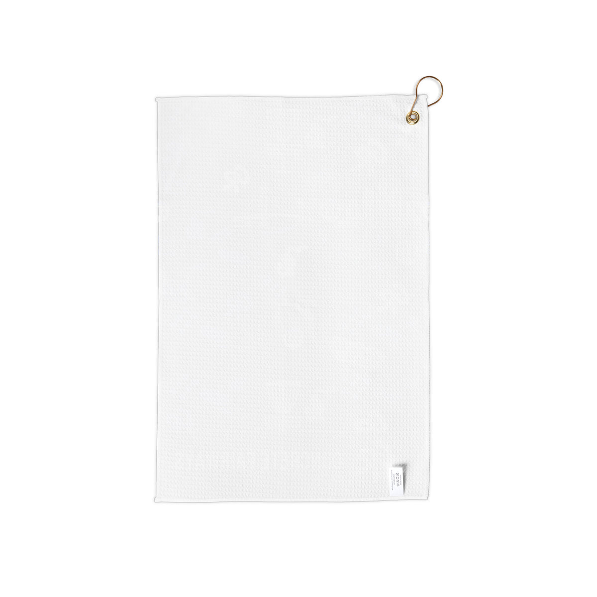 Back of the Concrete Fairways disc golf towel: plain white side with gold grommet, hanging ring and small label