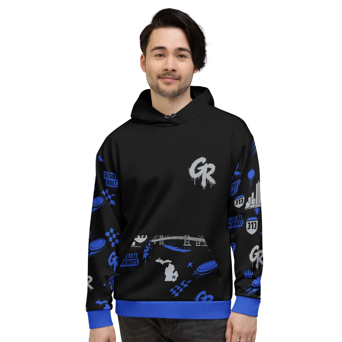 Model in black Concrete Fairways hoodie: gray GR chest logo, blue disc golf pattern sleeves and pocket, royal cuffs