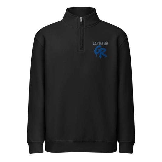 Concrete Fairways quarter-zip in black with arched gray GARVEY RD. over a royal drip GR on the left chest, front view